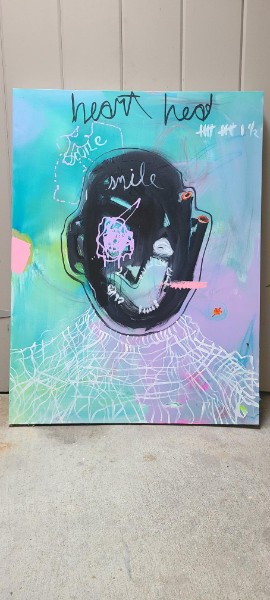Dark painted head on turquoise with handwritten text